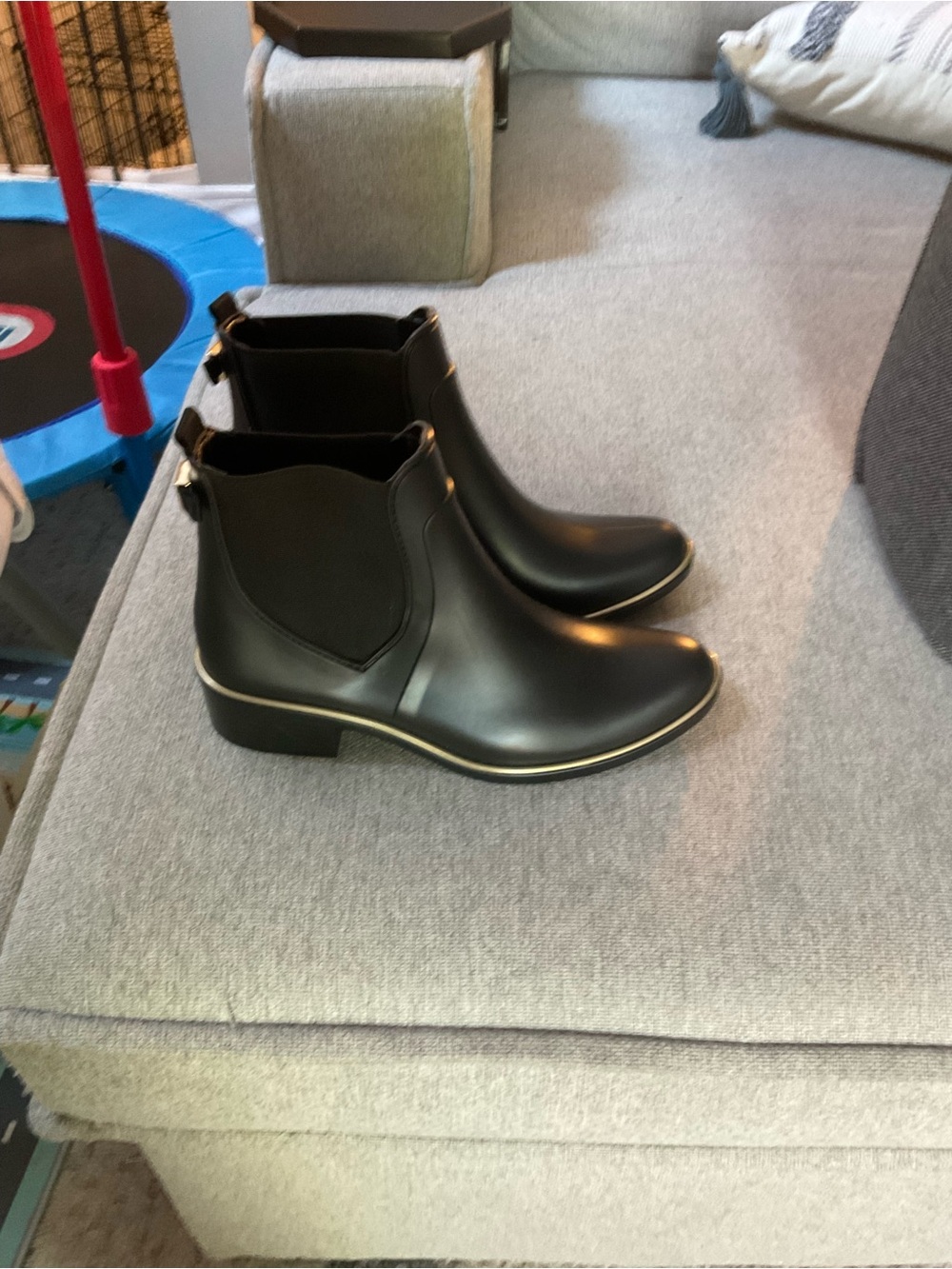 kate spade Black Chelsea Ankle Boots with Gold Accent